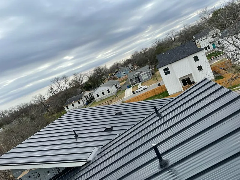 Standing seam metal roof panels with vents for Skylight Repair in Carmel